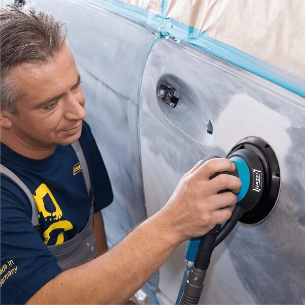 HAZET Ponceuse excentrique 9033-2 I avec tuyau d'aspiration, sac de récupération et plateau de ponçage à 15 trous I hauteur réduite et carter composite léger pour un ponçage maniable'.